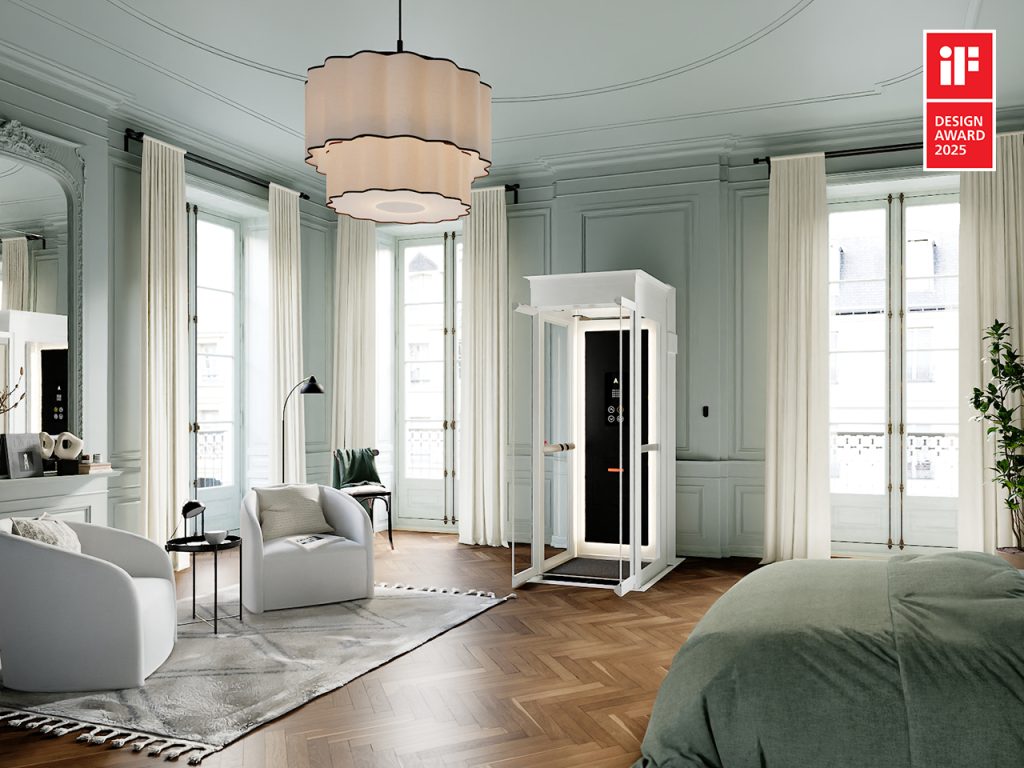 White glass Ascenda home elevator in a traditional room with tall windows and pale green walls.
